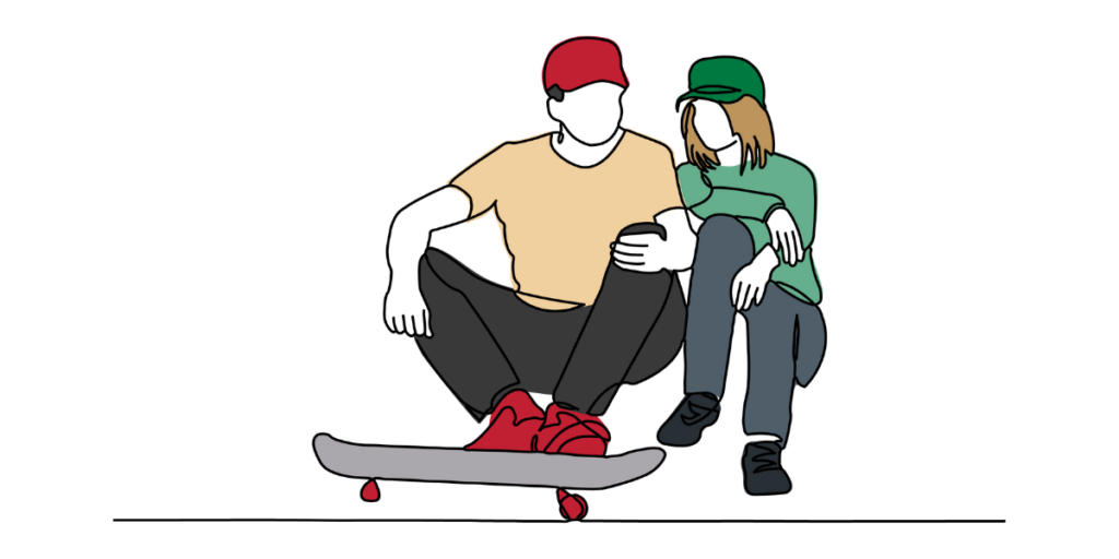 two people sitting with a skateboard